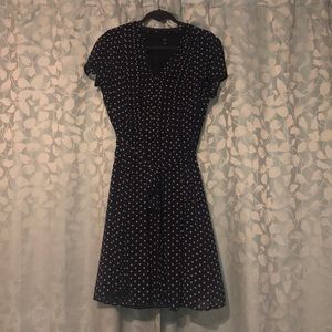 Navy blue polka dot dress.